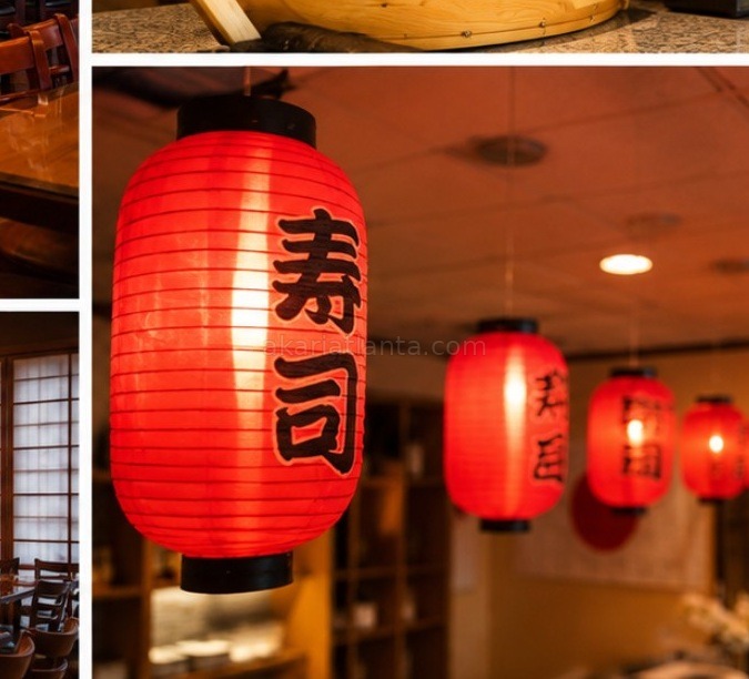 Traditional red lanterns above the sushi counter