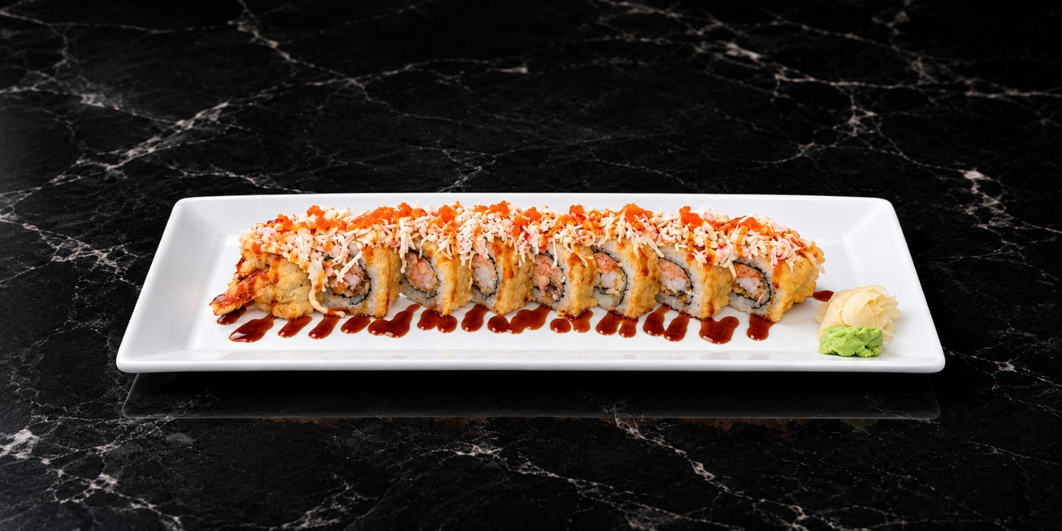 Crispy sushi roll with sauce and roe